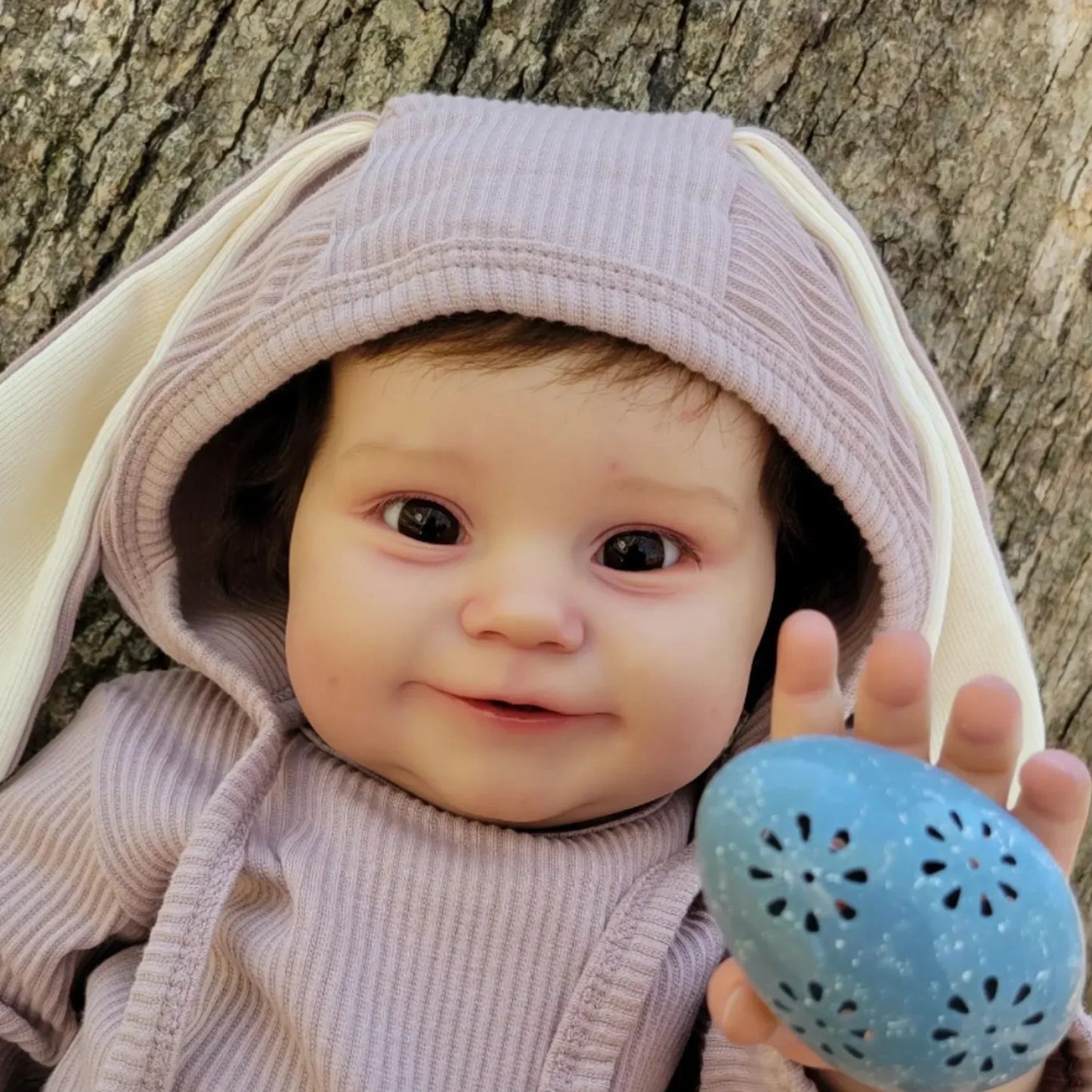 Lalka reborn z uśmiechem